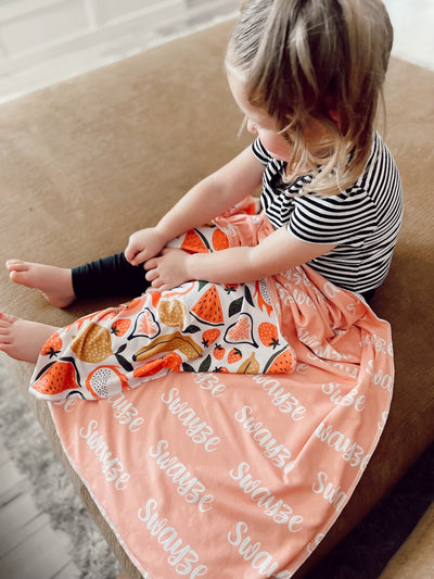 The Perfect Baby Shower Gift: Why 2-Sided Swaddle Blankets Always Win Hearts