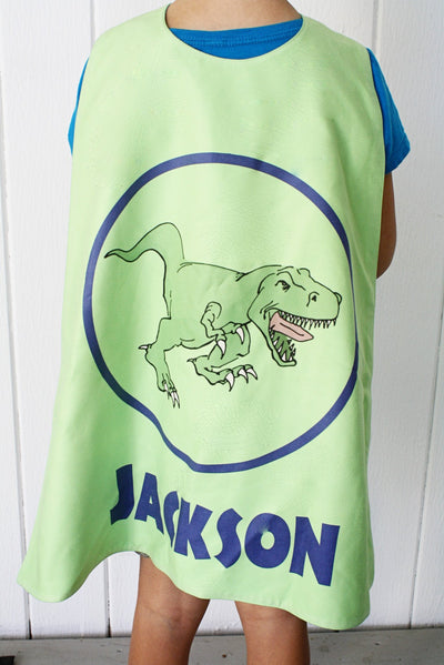 Reversible Dinosaur in Blue Circle on Green